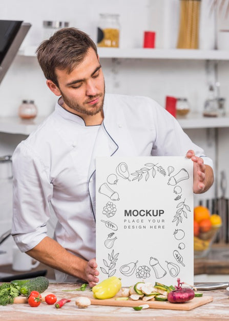 Free Young Chef In The Kitchen Mock-Up Psd