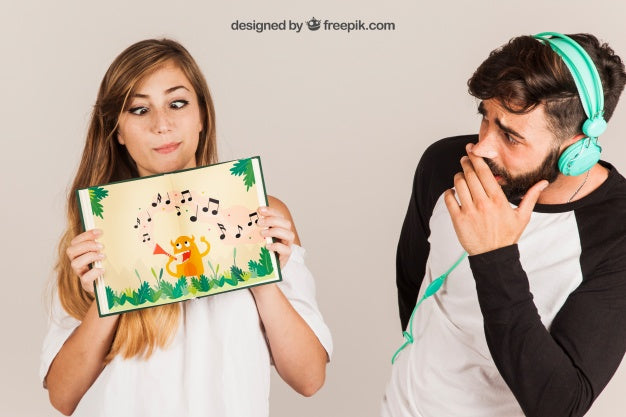 Free Young Couple Presenting Book Psd