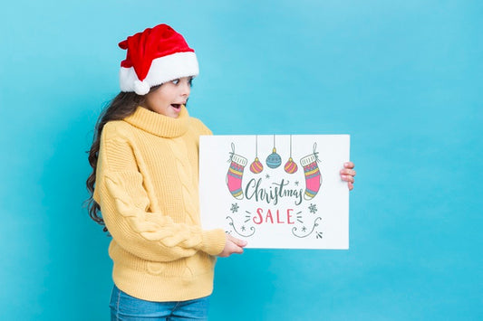 Free Young Girl Looking Surprised At Christmas Sale Advert Psd