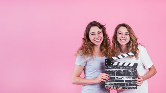 Free Young Girls Holding Clapperboard Mockup Psd