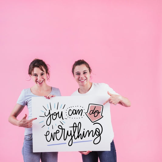 Free Young Girls Holding White Board Mockup Psd