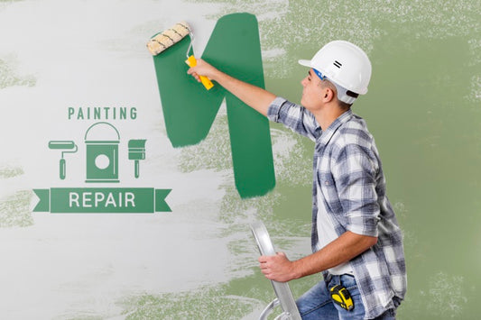 Free Young Handyman Painting The Wall In Green Psd