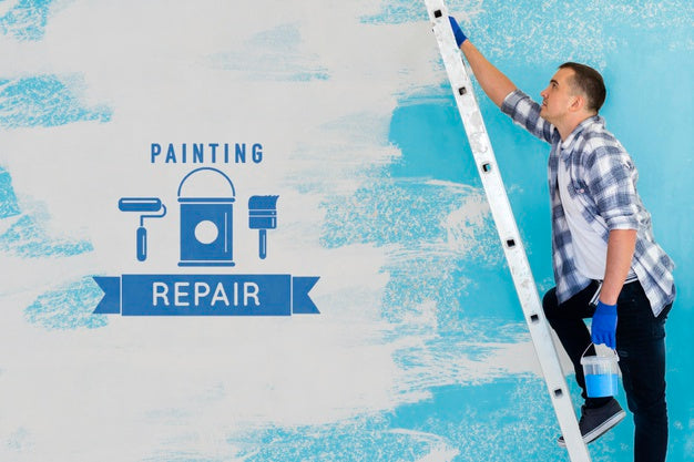 Free Young Handyman Repairing The Wall Psd