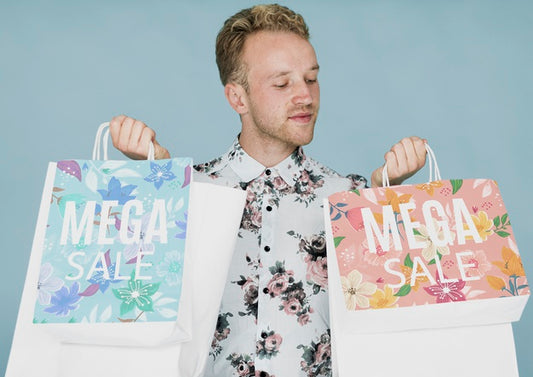Free Young Male Checking Shopping Bags Psd