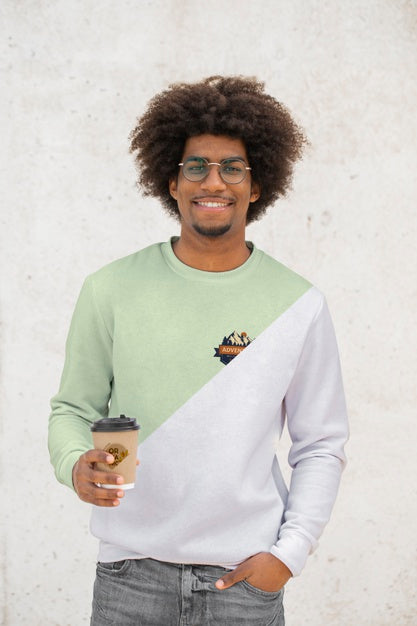 Free Young Man With Hoodie Drinking Coffee Psd