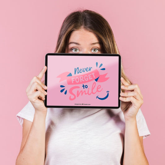Free Young Woman Covering The Face Till The Eyes With A Tablet Mock-Up Psd