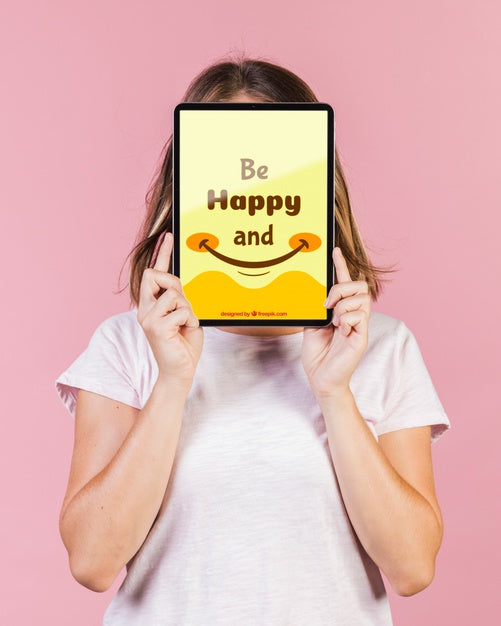 Free Young Woman Covering The Face With A Tablet Mock-Up Psd