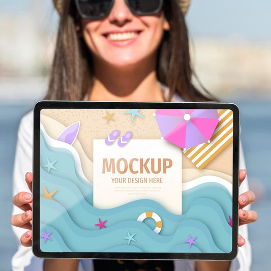 Free Young Woman Holding A Mock-Up Tablet Psd
