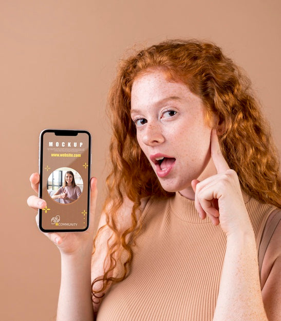 Free Young Woman Holding A Smartphone Mock-Up Psd