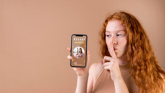 Free Young Woman Holding A Smartphone Mock-Up Psd
